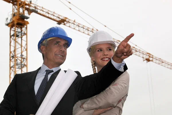 Architect and assistant happy with progress — Stock Photo, Image