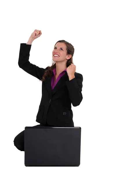 Excited businesswoman with laptop Royalty Free Stock Photos