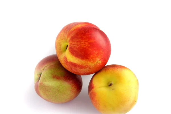 Três maçãs vermelhas e amarelas — Fotografia de Stock