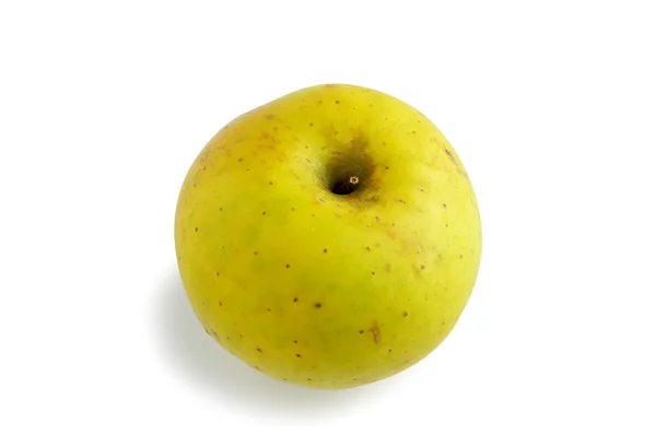 Una mela gialla — Foto Stock