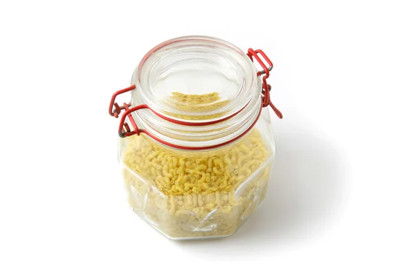Glass jar of pasta — Stock fotografie