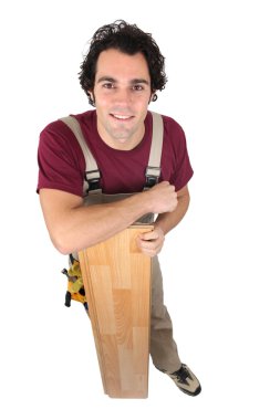 Man stood with laminate flooring clipart