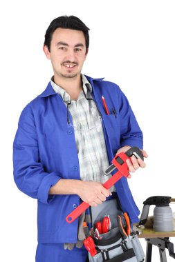 Skilled technician with tools clipart