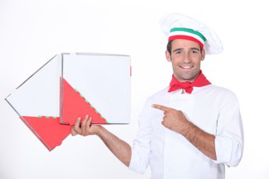 Chef pointing at pizza boxes clipart