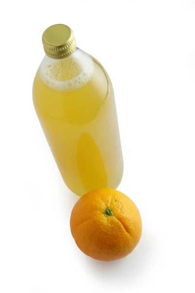 Láhev pomerančové šťávy — Stock fotografie