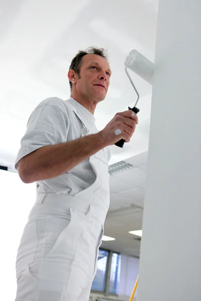 Man repainting entire room — Stock Photo, Image