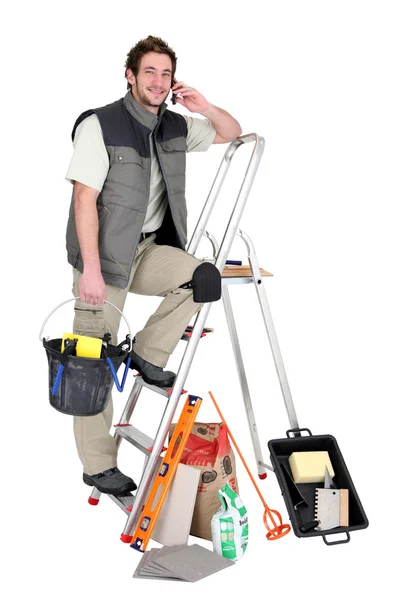 Tiler surrounded by his equipment — Stock Photo, Image