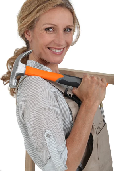 Woman with hammer — Stock Photo, Image