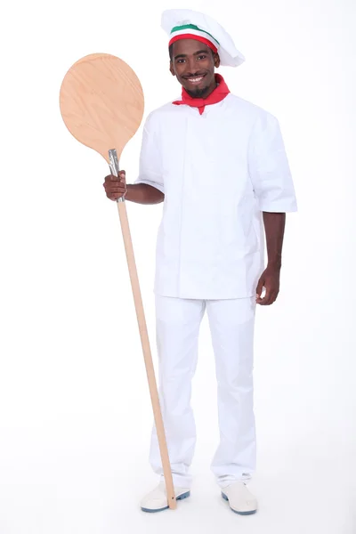 Pizza chef with a wooden board — Stock Photo, Image