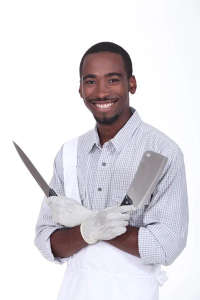 Rzeźnik trzyma noże — Zdjęcie stockowe