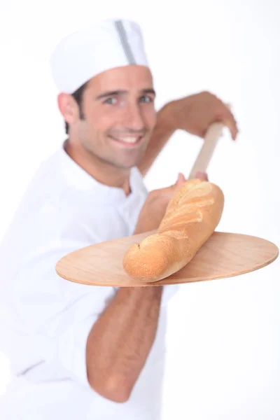 Panadero hornear pan — Foto de Stock