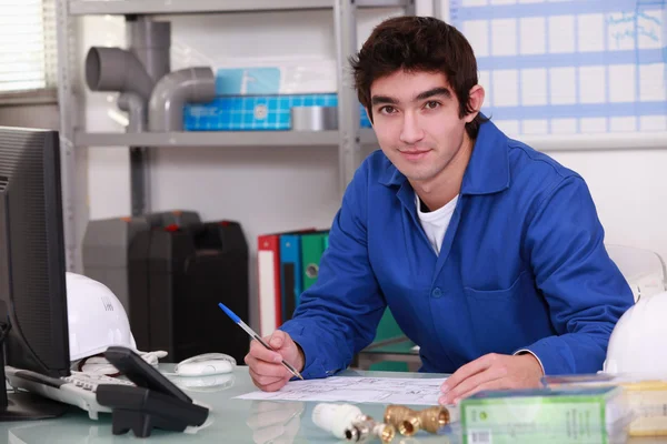 Young worker in warehouse — Stock Photo, Image