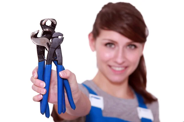 Woman with pliers — Stock Photo, Image