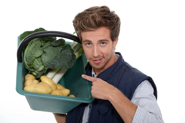 Portrét zahradník se zeleninou — Stock fotografie