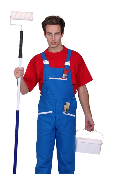 Painter with paint roller and box — Stock Photo, Image