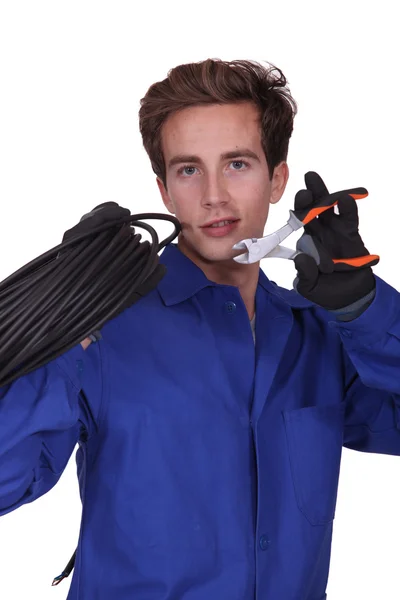 Electricista con un par de cortadores —  Fotos de Stock
