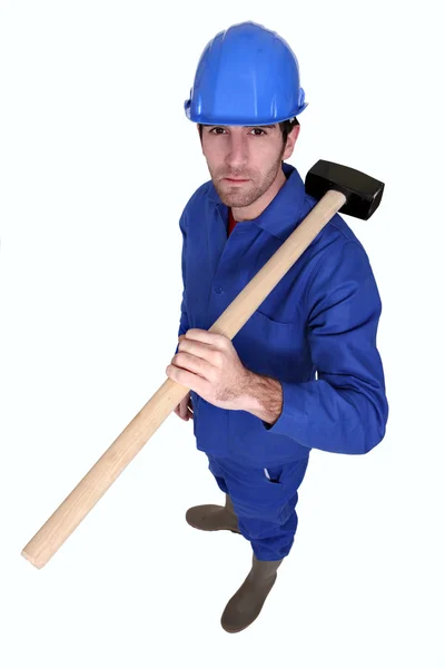 Craftsman with hammer on shoulder — Stock Photo, Image