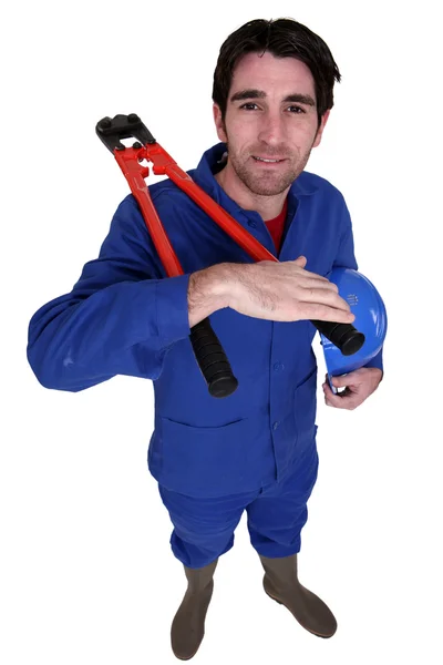 Builder with a pair of bolt cutters — Stock Photo, Image