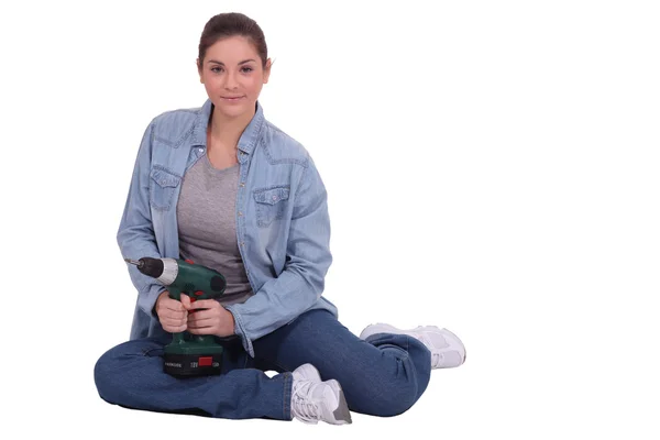 Frau mit Bohrer — Stockfoto