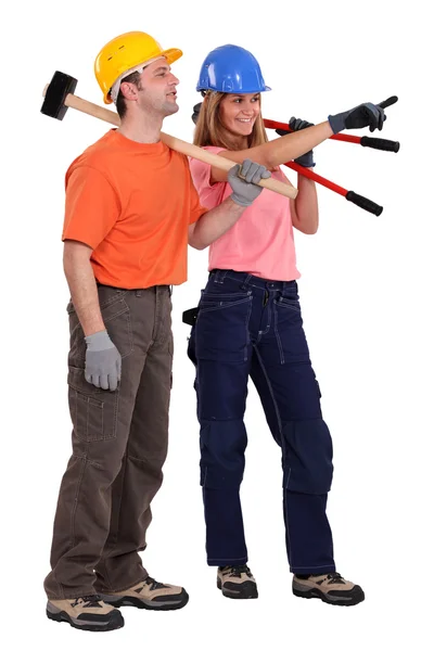 Handwerker und Handwerkerin arbeiten zusammen — Stockfoto