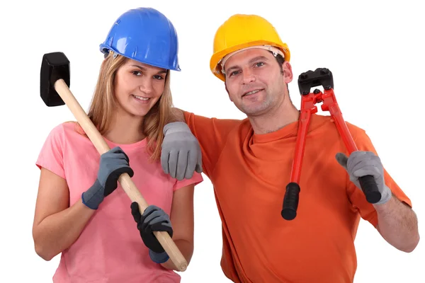 Man and woman with hammer — Stock Photo, Image