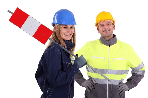 Férfi és nő építőmunkások — Stock Fotó