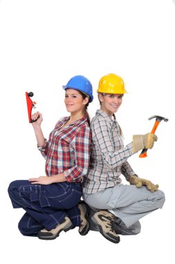 Duo of happy craftswomen back to back clipart