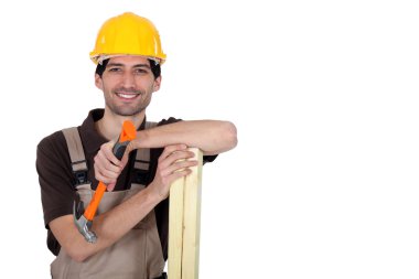 Carpenter with hammer clipart