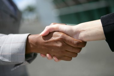 Interracial business hand-shake clipart