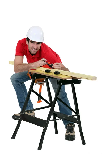 Happy carpenter, studio shot — Stock Photo, Image