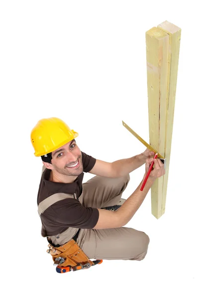 Man measuring wood — Stock Photo, Image