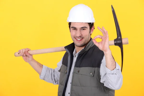 OK from a man with a pickaxe — Stock Photo, Image