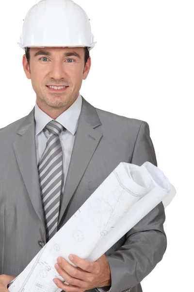 Businessman with plans — Stock Photo, Image