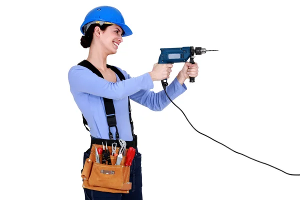 Construction worker holding screwdriver Stock Photo