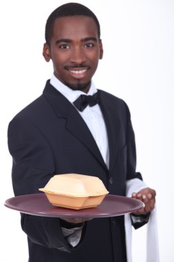 Waiter holding tray with fast food container clipart