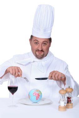 Chef having meal in restaurant clipart