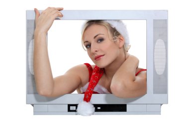 Woman protruding from a television screen clipart