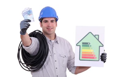 An electrician showing an energy class chart clipart