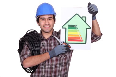 Electrician holding an energy consumption label clipart