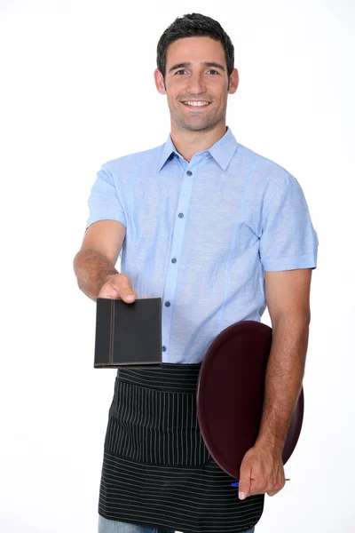 Kelner oferuje menu — Zdjęcie stockowe