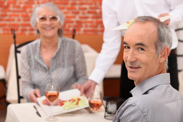Couple in a restaurant — Stock Photo, Image