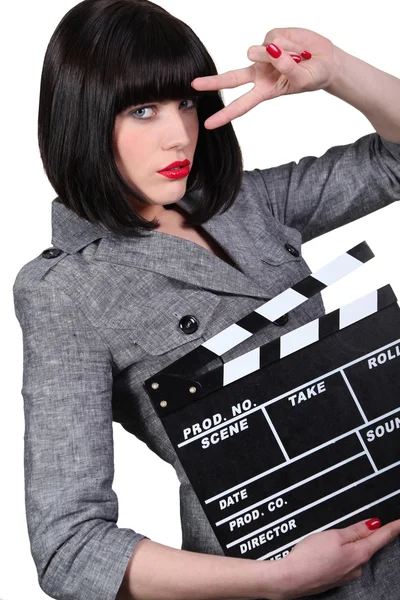 Take two: Girl with a film clapperboard — Stock Photo, Image