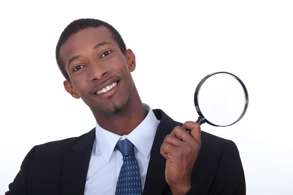 Portrait of a man with magnifying glass — Stock Photo, Image