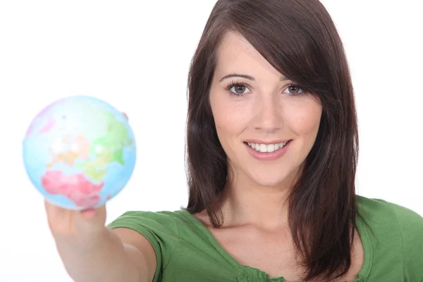 Chica sosteniendo un globo —  Fotos de Stock