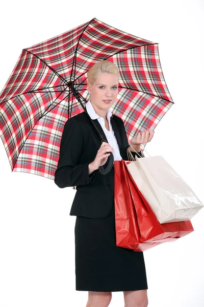 Žena s skotský deštník — Stock fotografie