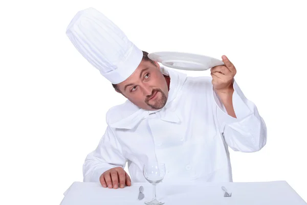 Chef inspecionando a limpeza dos pratos — Fotografia de Stock