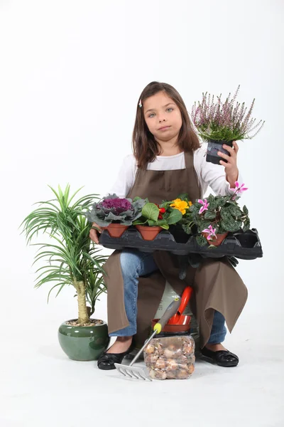 Menina fingindo ser florista — Fotografia de Stock