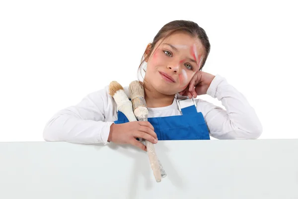 Messy little girl painting — Stock Photo, Image