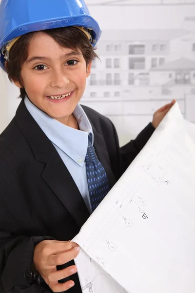 stock image Little boy imitating architect