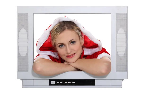 Mulher natalícia dentro de um aparelho de televisão — Fotografia de Stock